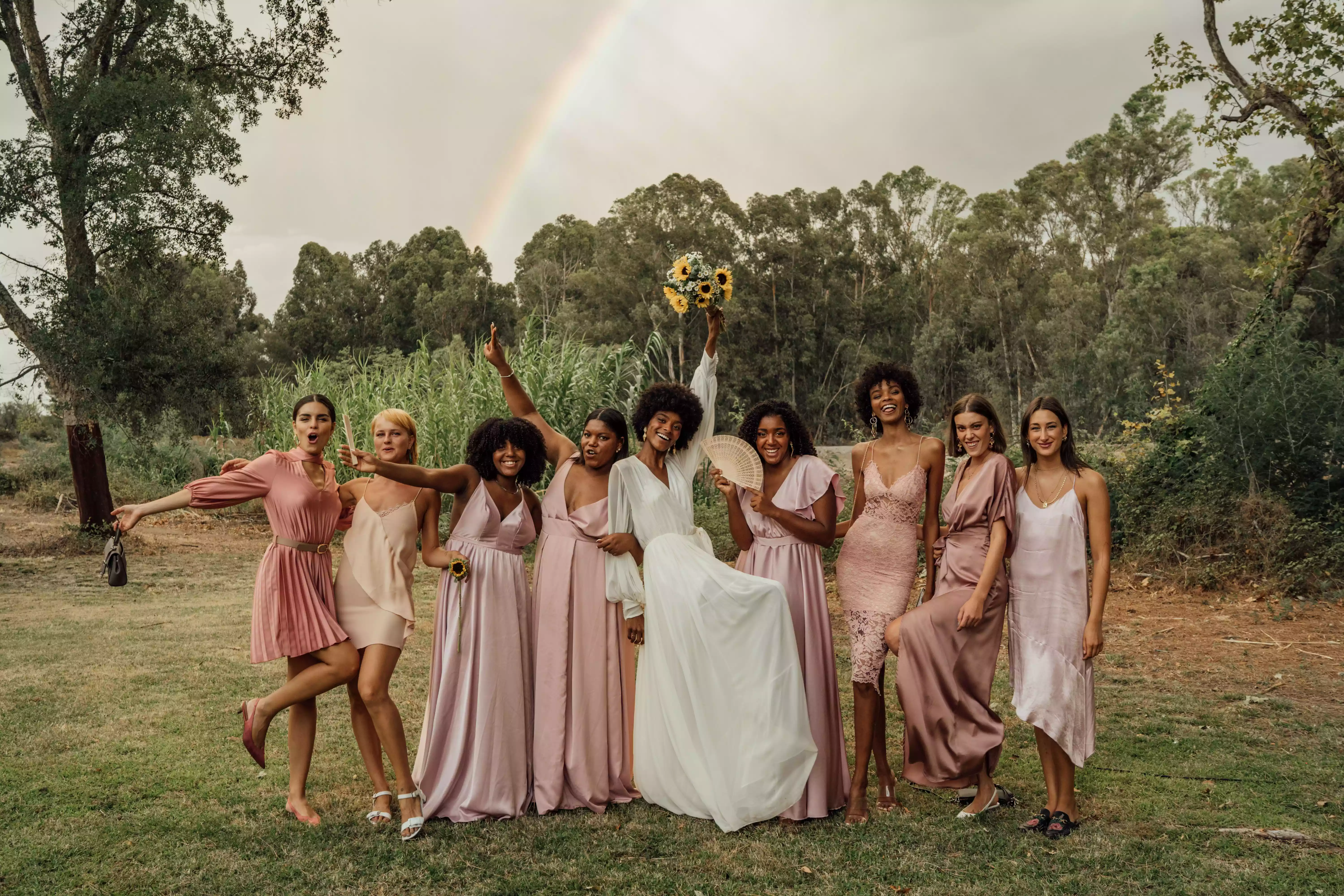 bridal party with rainbow